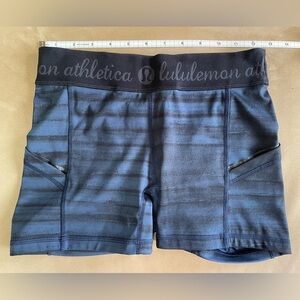 lululemon athletica navy and black athletic performance fit shorts.